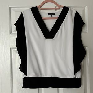 Perfect for business flowing black and white blouse.